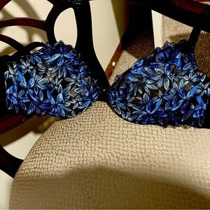 NWOT Victoria Secret Sexy Blue Flowered Bra on a Black See-through Background